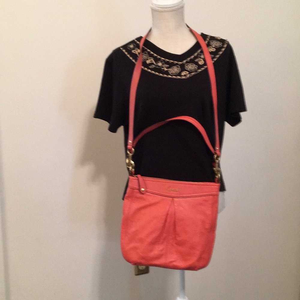 Coach salmon colored purse with 2 straps